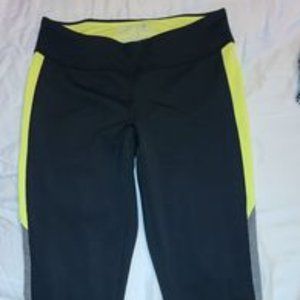 New Balance, size medium. Mid-rise and sits below the knee.